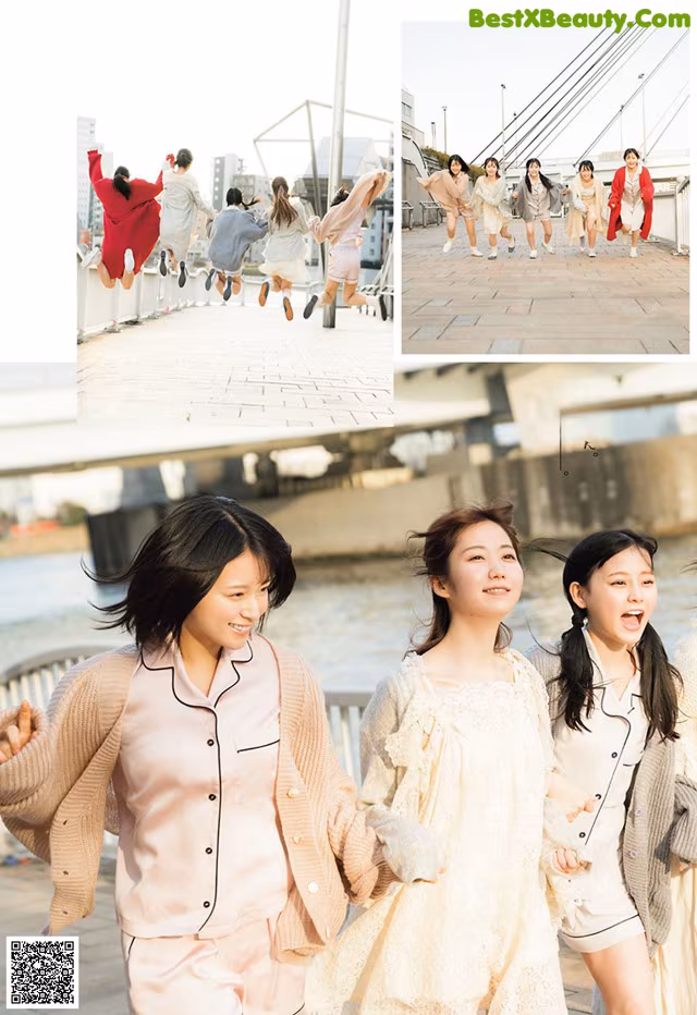 A group of young women walking down a sidewalk.